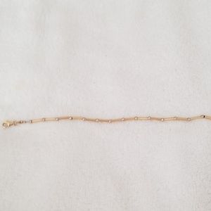 7in 14k gold bracelet with white gold beads